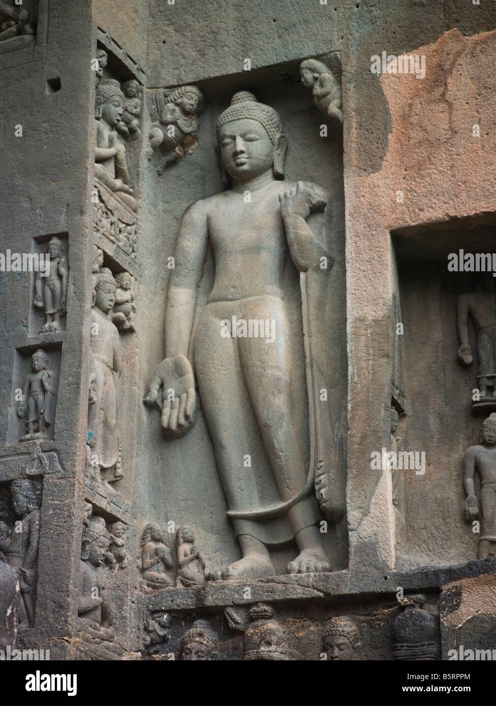 Ajanta India. Cave 19 Buddhist temple carved from basalt rock. exterior figure of Buddha from 2nd century BC Stock Photo