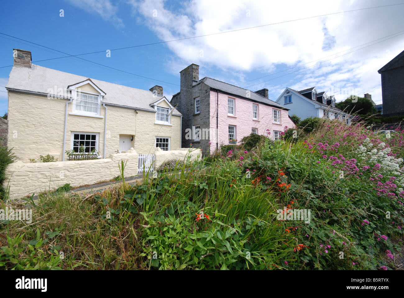Traditional light painted Welsh cottages in St.Davids, Pembrokeshire, Wales Stock Photo