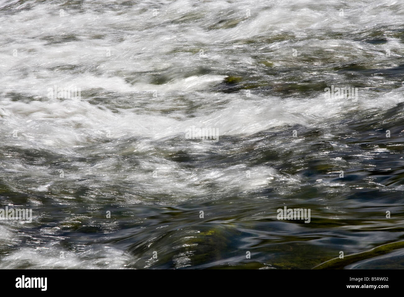 Flowing water of the blue danube Stock Photo