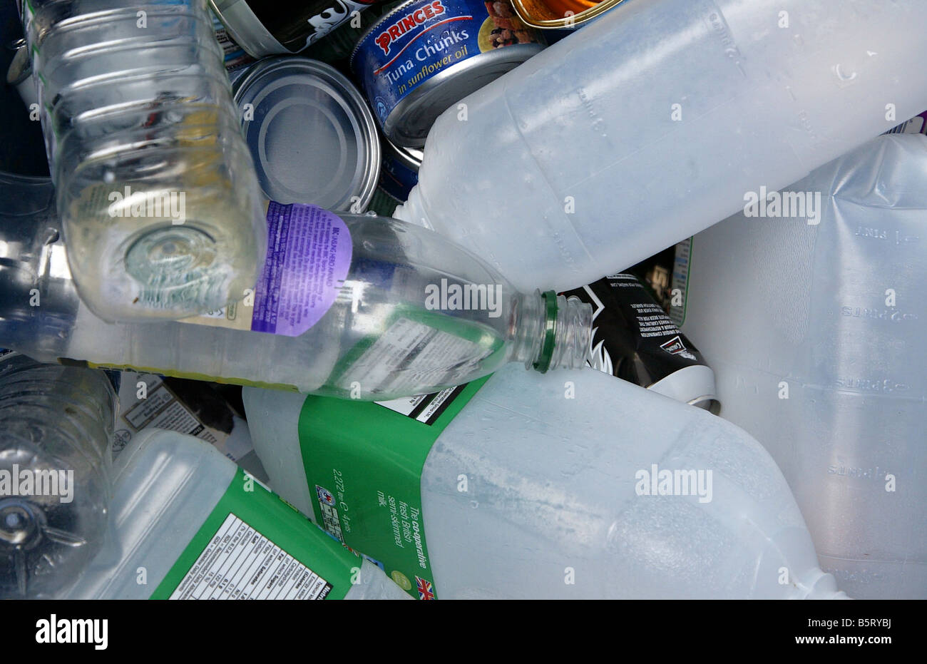 Plastic bottles and tins in a recycling bin Stock Photo Alamy
