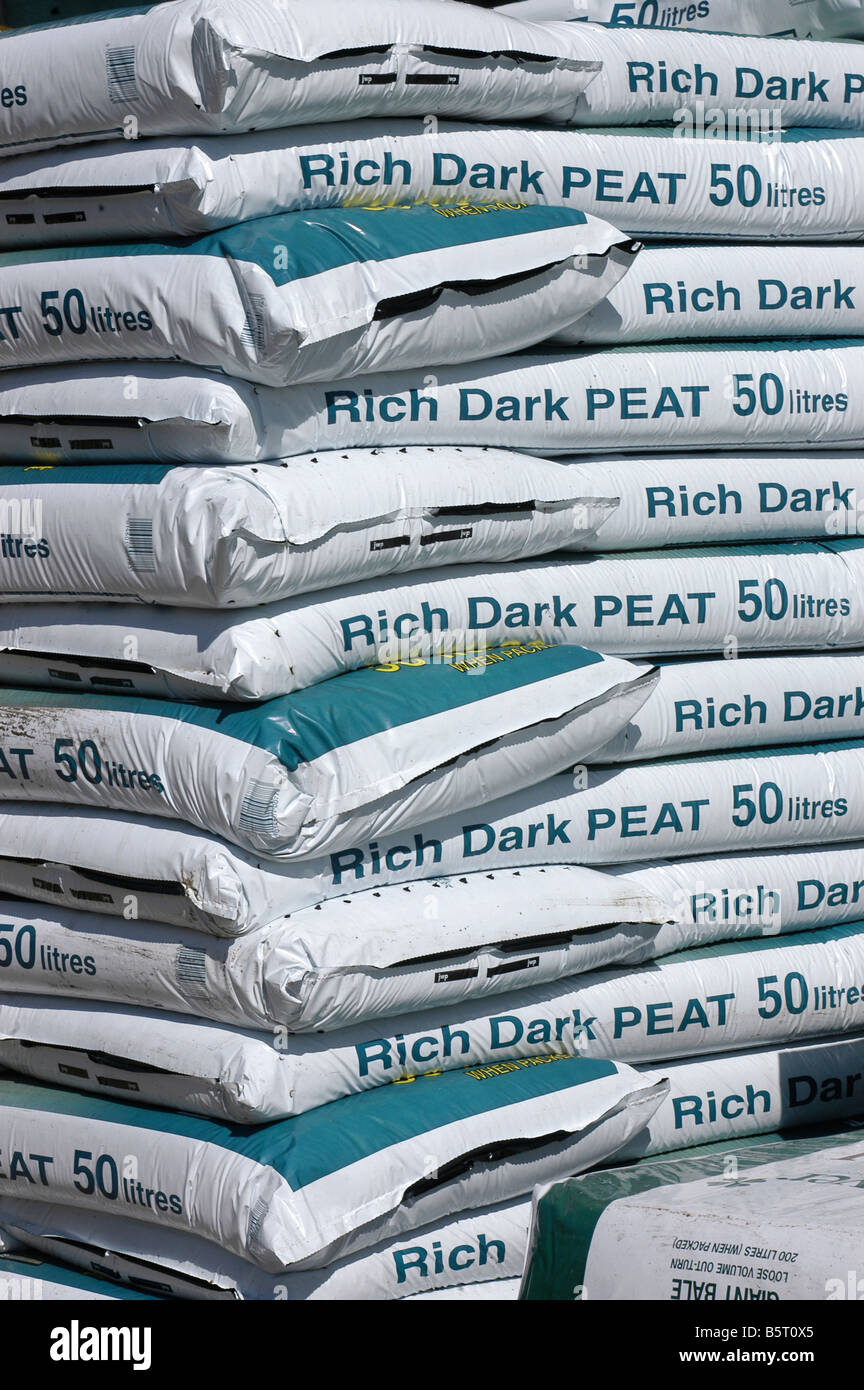 bags of Irish peat for sale at garden centre Stock Photo
