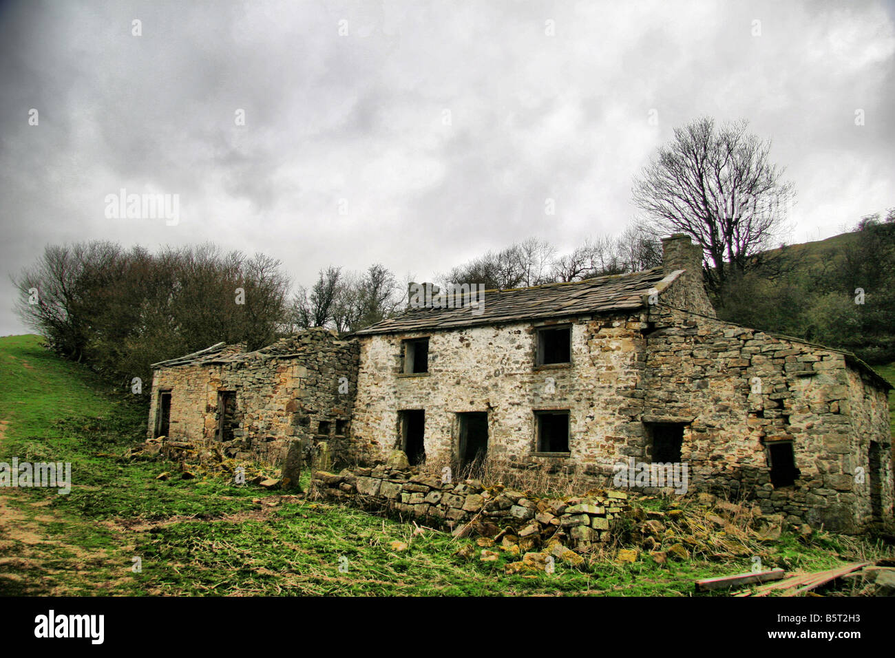 Derelict house, building on a walk in yorkshire dales in colour Stock