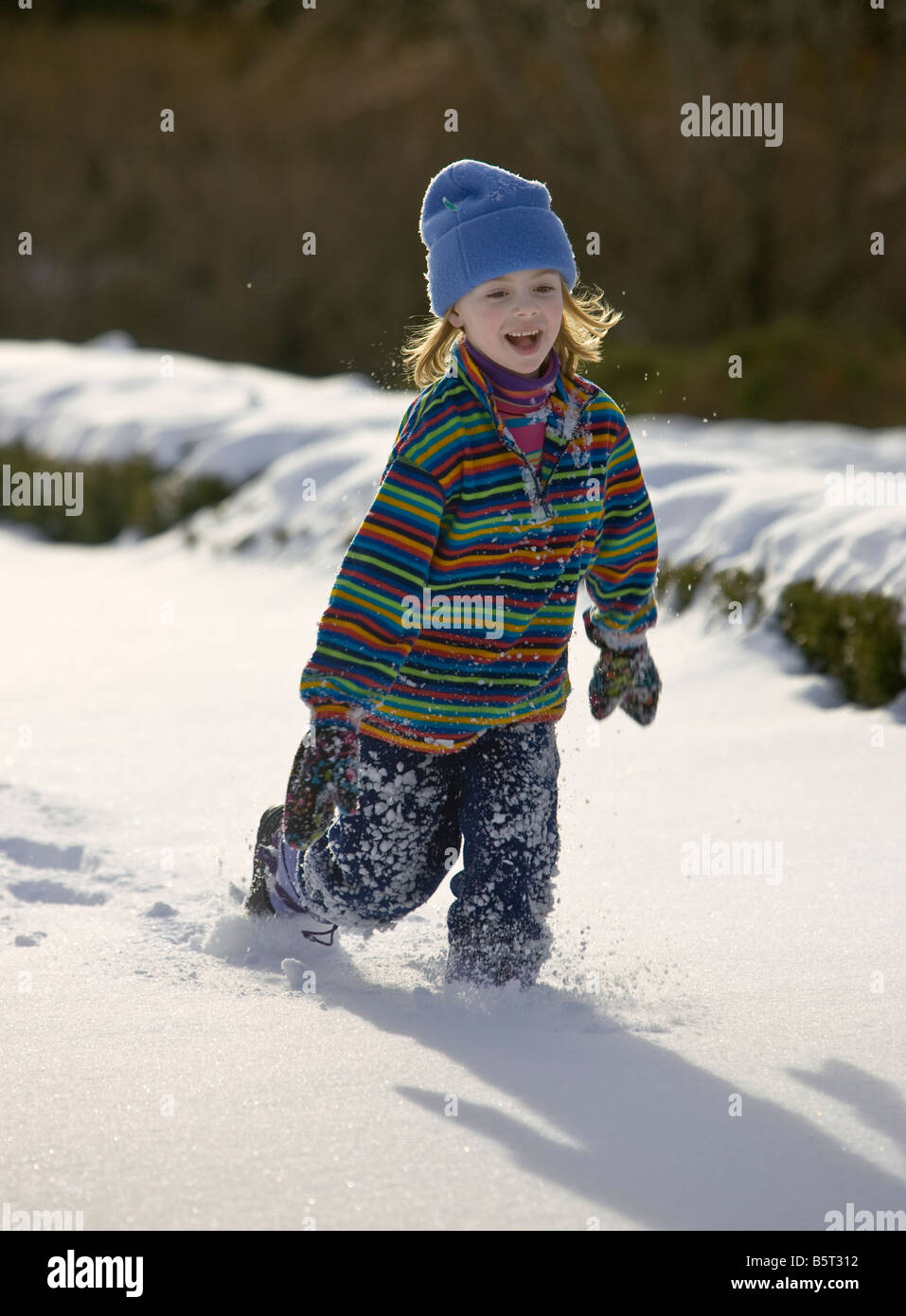 Walking through snow hi-res stock photography and images - Alamy