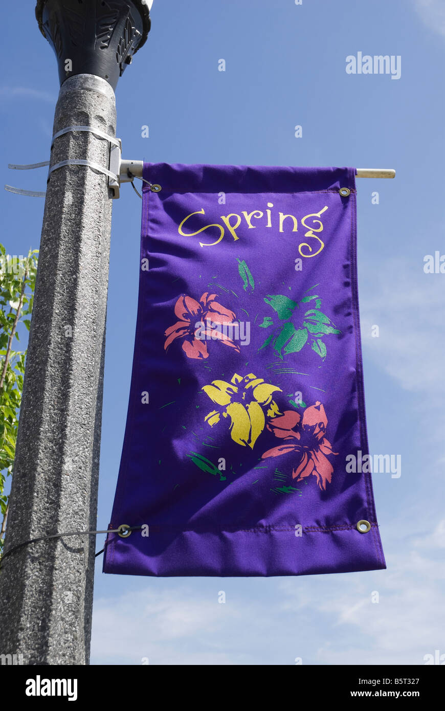 spring banner on lightpost in new shopping center North Florida Stock Photo