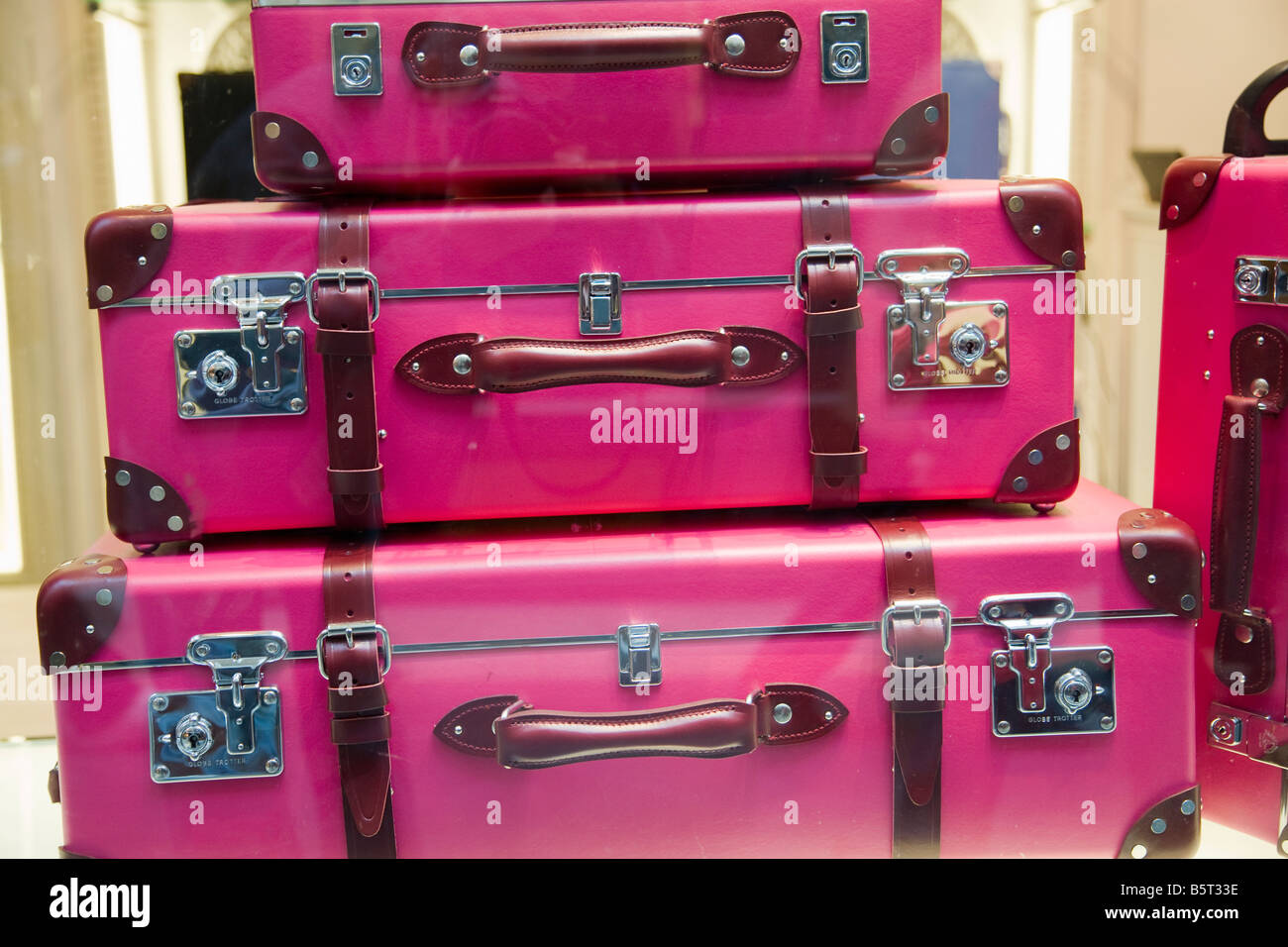 Stack of Purple suitcases Stock Photo