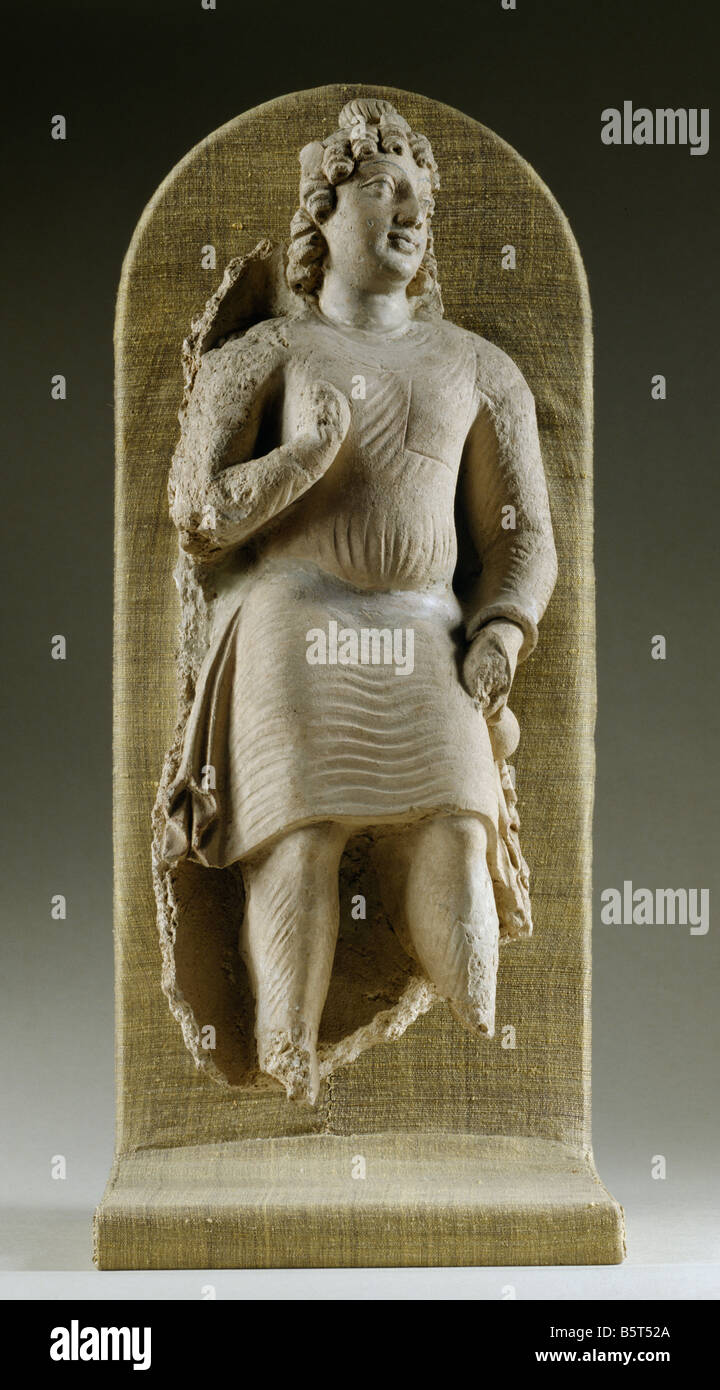 Standing youth early Indian sculpture. Stucco from Gandhara. National Museum of New Delhi India 49.20/29 Stock Photo