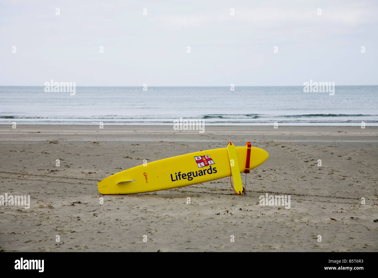 Poppit Sands Cardigan Bay Wales UK RNLI Royal National Lifeboat Institution Surf board for life guard Stock Photo