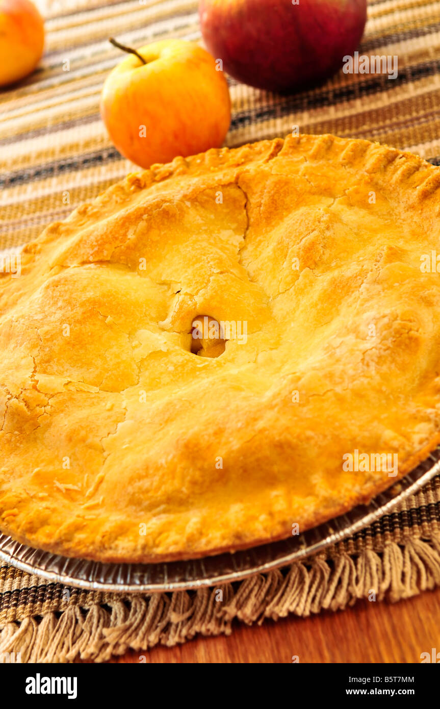 Whole apple pie with apples close up Stock Photo