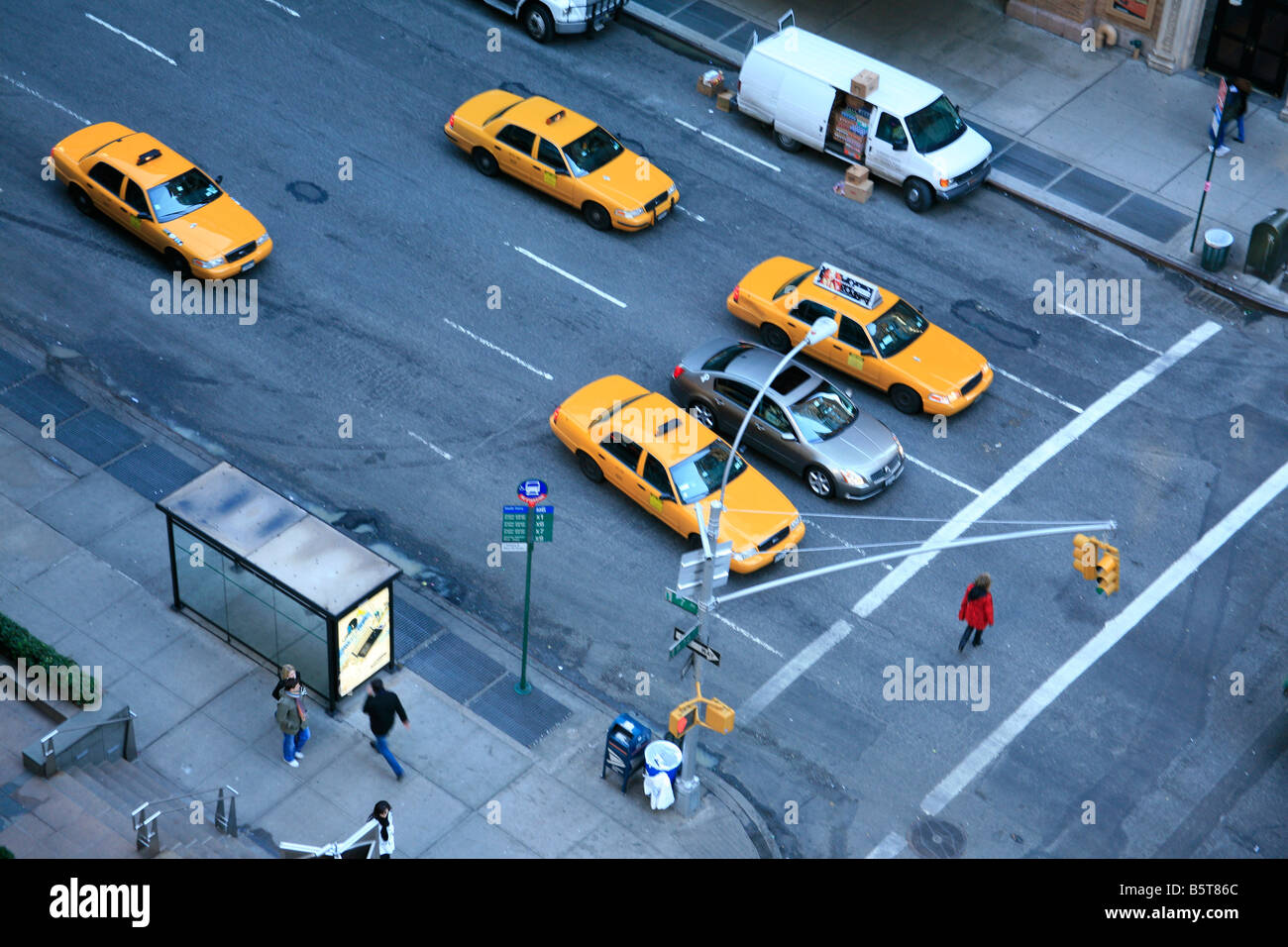Yellow taxi cabs at a waiting at traffic lights, New York, USA Stock