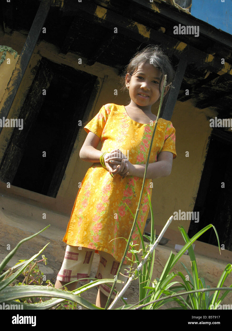 Cute little Nepali girl in a village in the hills surrounding the Kathmandu  valley, Nepal, central Asia Stock Photo - Alamy