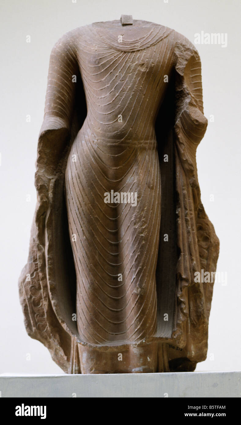 Standing Buddha head missing. Red sandstone. 5th century. From Mathura Uttar Pradesh. National Museum of New Delhi India 7/100. Stock Photo