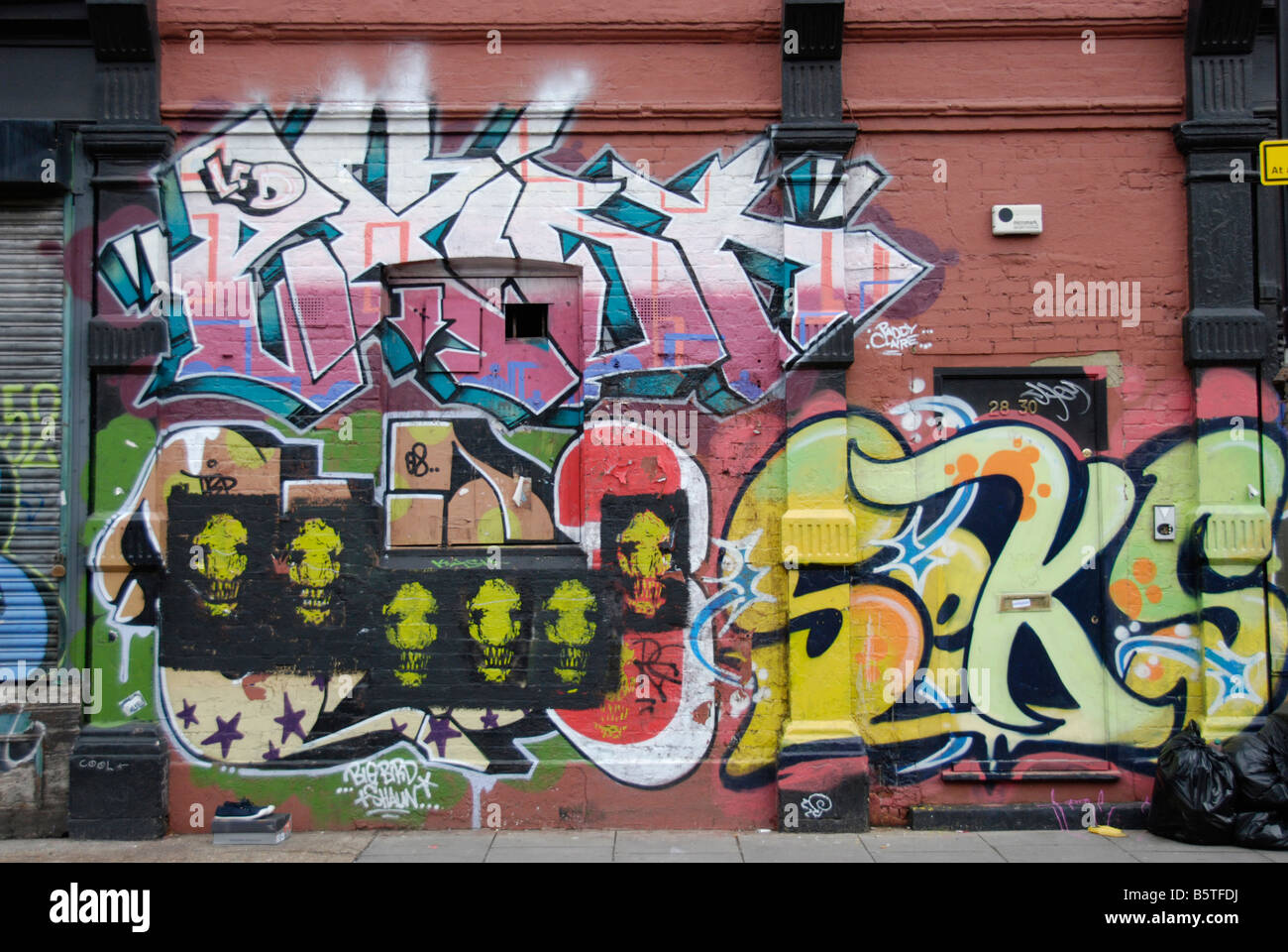 Property completely covered in graffiti Sclater Street London Stock Photo
