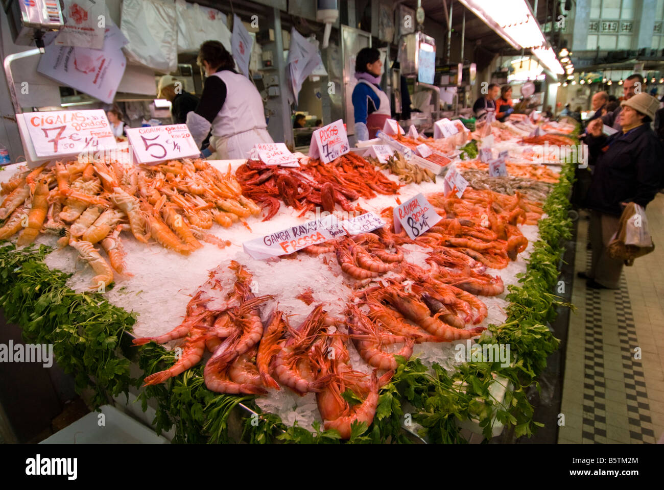 Shrimps on seafood stall in the central fish market Mercado Central in