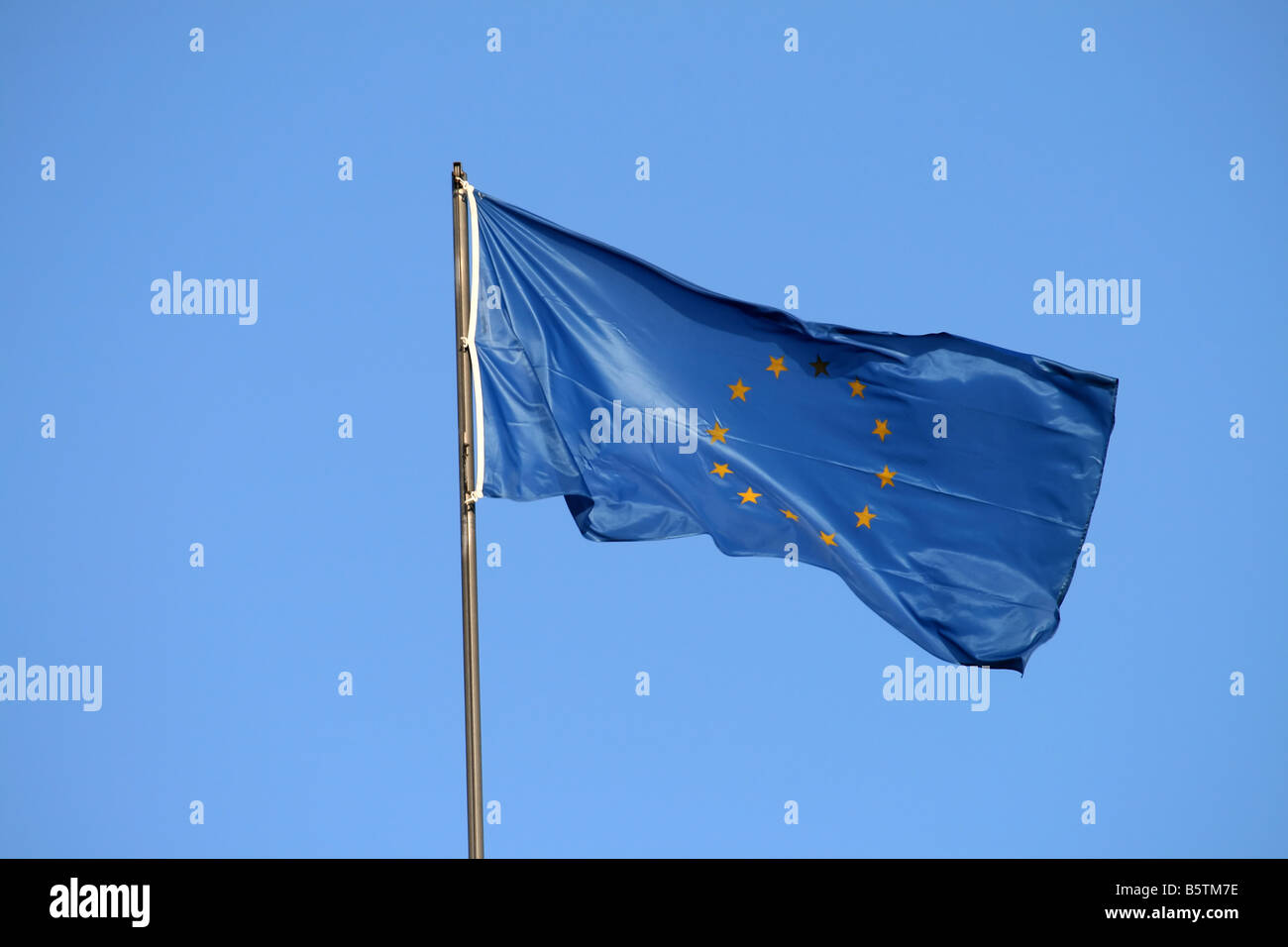 european union flag on the wind yellow stars Stock Photo