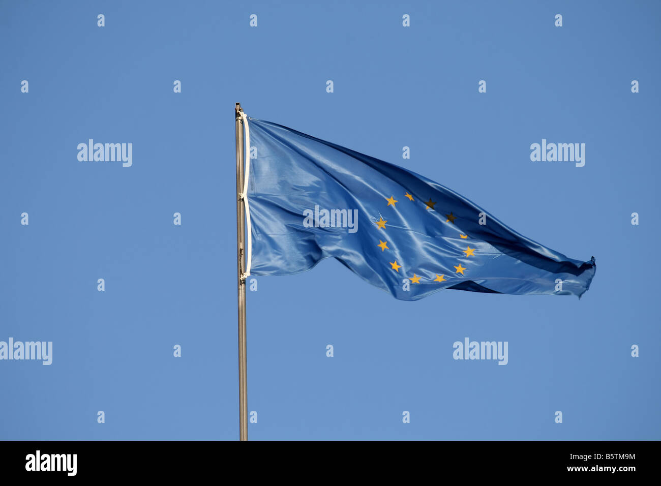 european union flag on the wind yellow stars Stock Photo