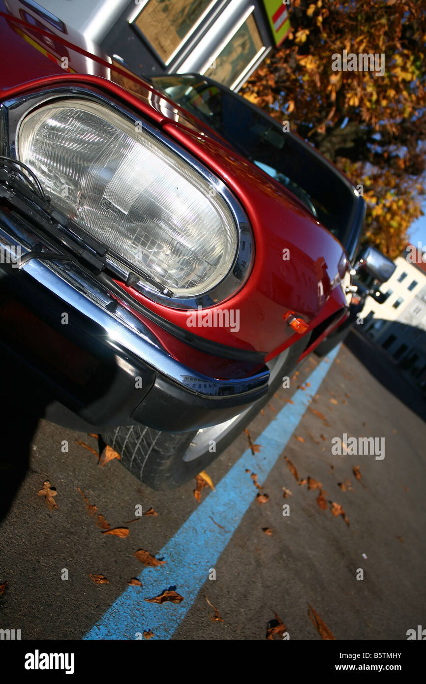 retro style sports car on a parking lot Stock Photo