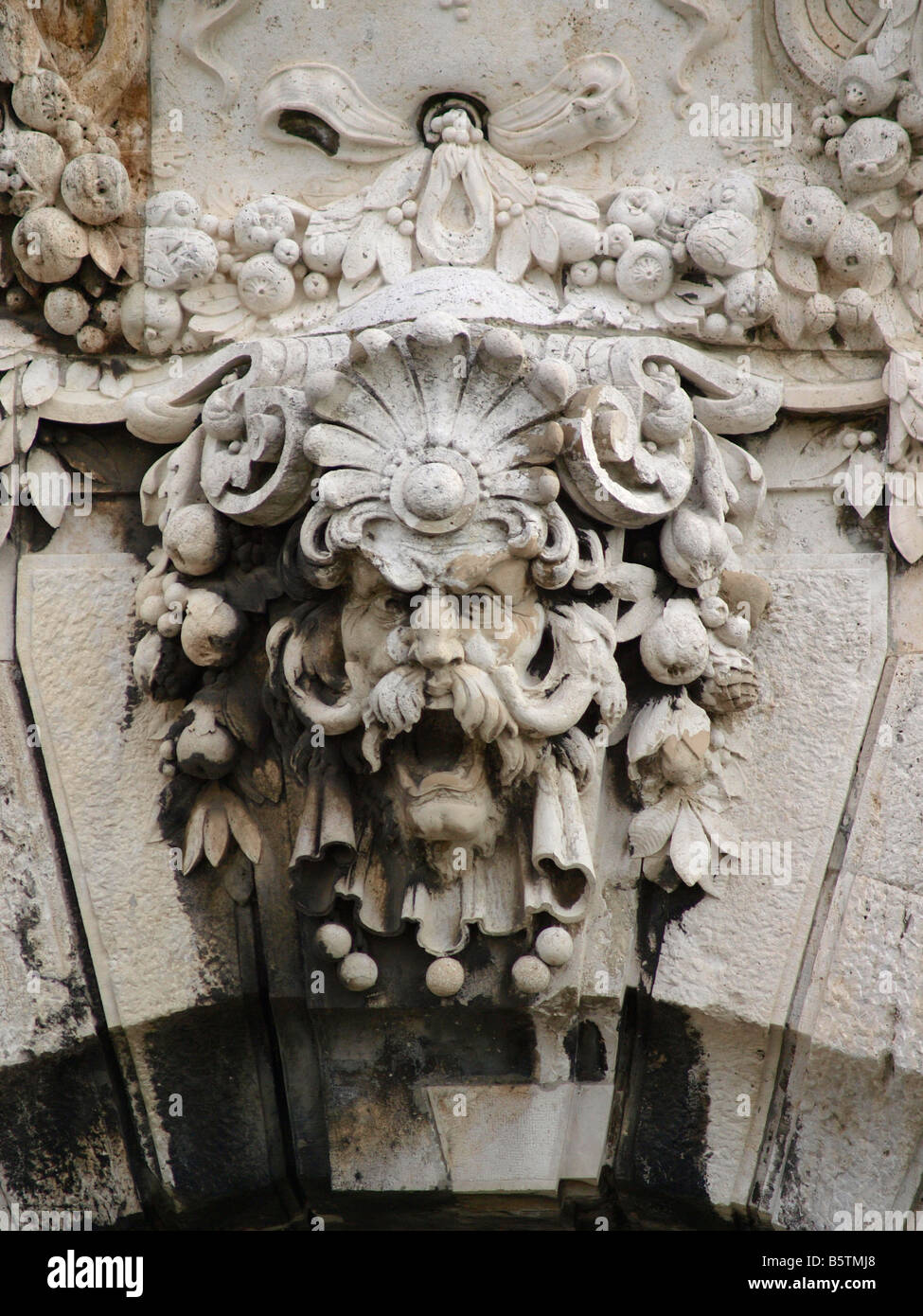 Fearsome carved stone face over the gate to the Royal Palace Castle Hill Budapest Hungary Stock Photo