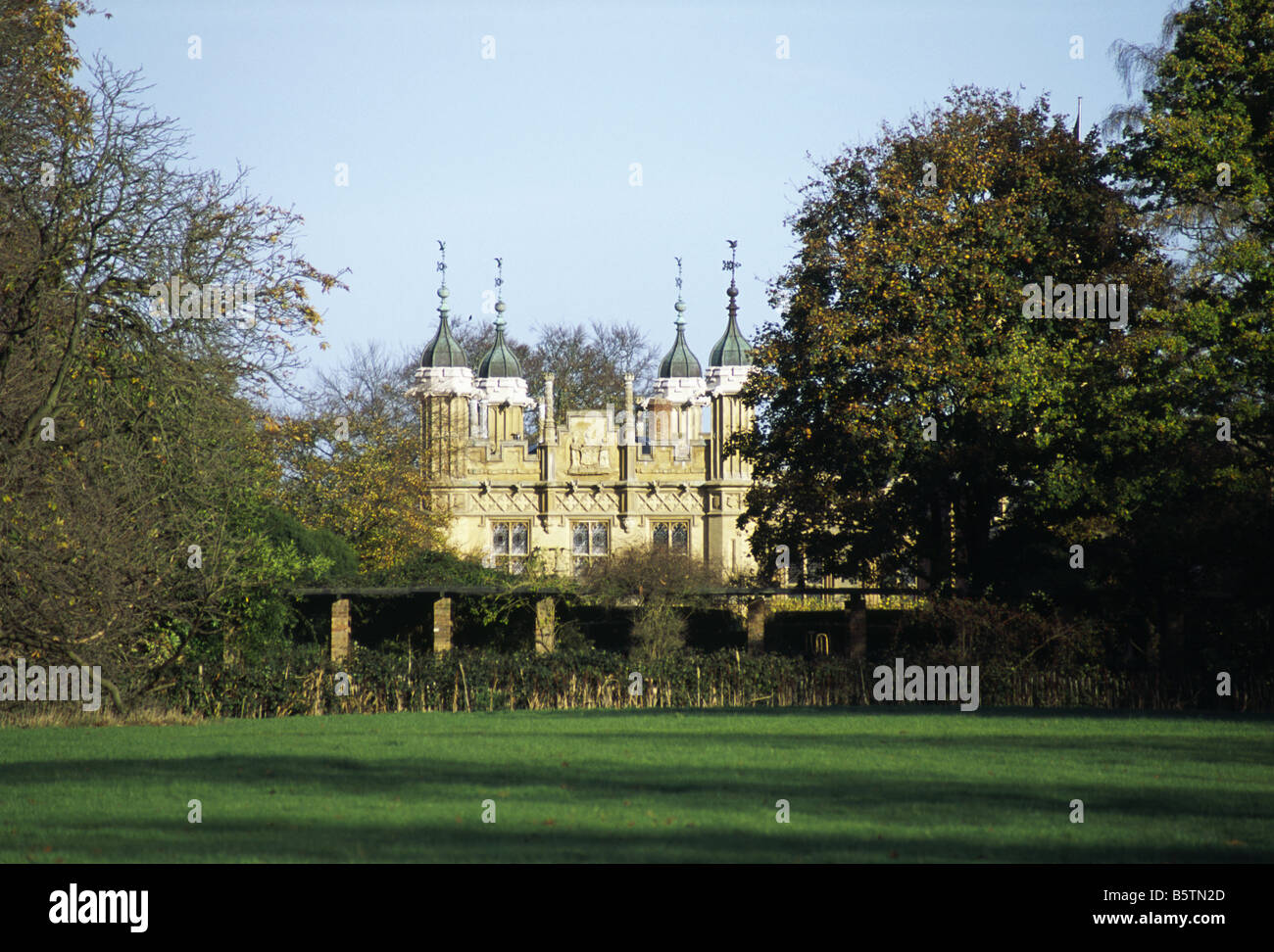 15th Century Gothic Knebworth House Framed by Trees in Park Grounds Hertfordshire England UK 2006 NR Stock Photo