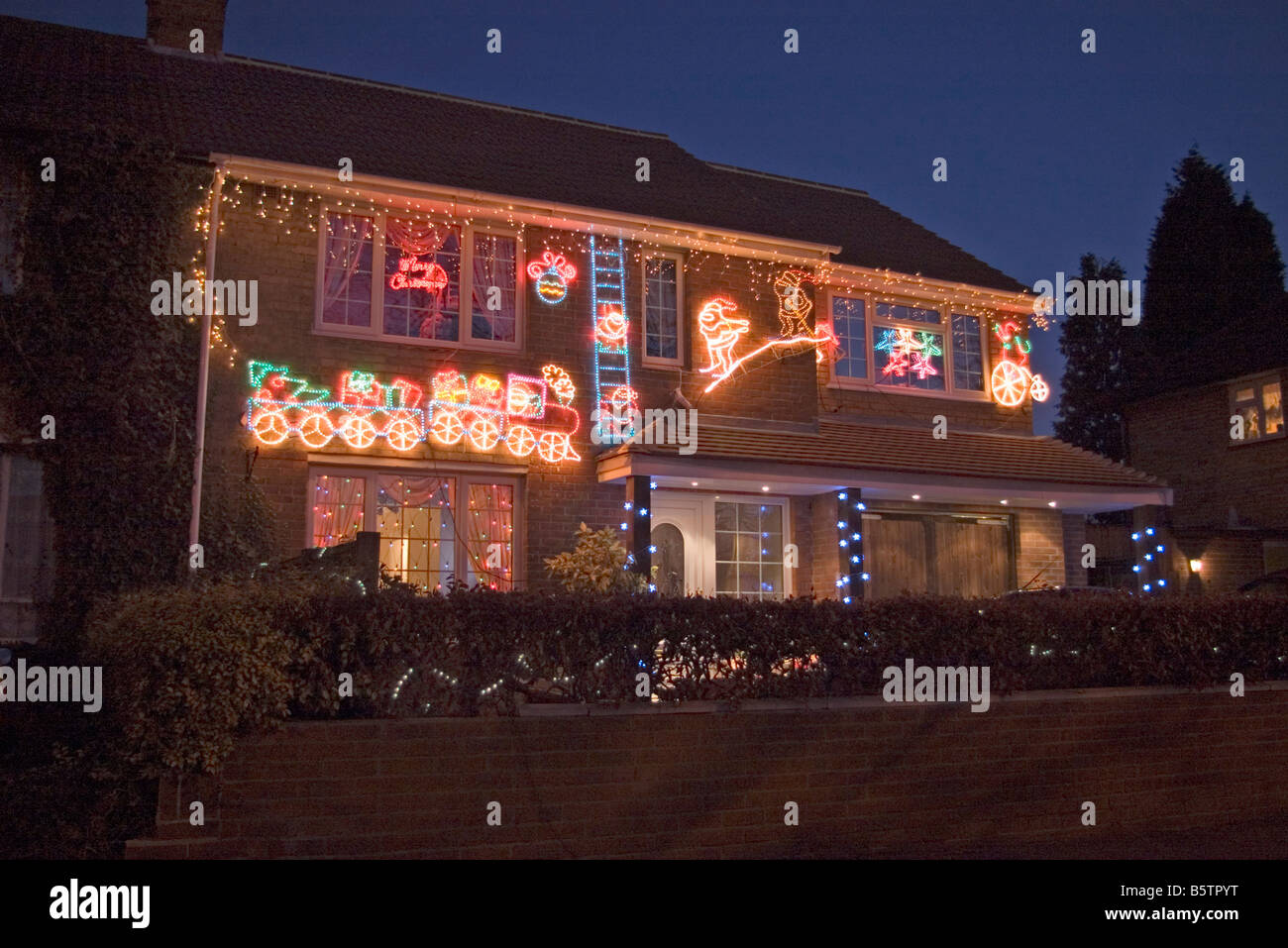 House Lit illuminated with Christmas Lights Stock Photo