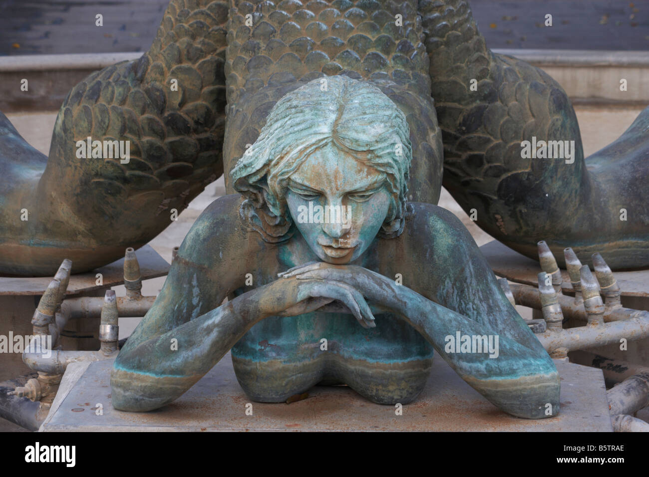 Mermaids in dry fountain in Spain Stock Photo