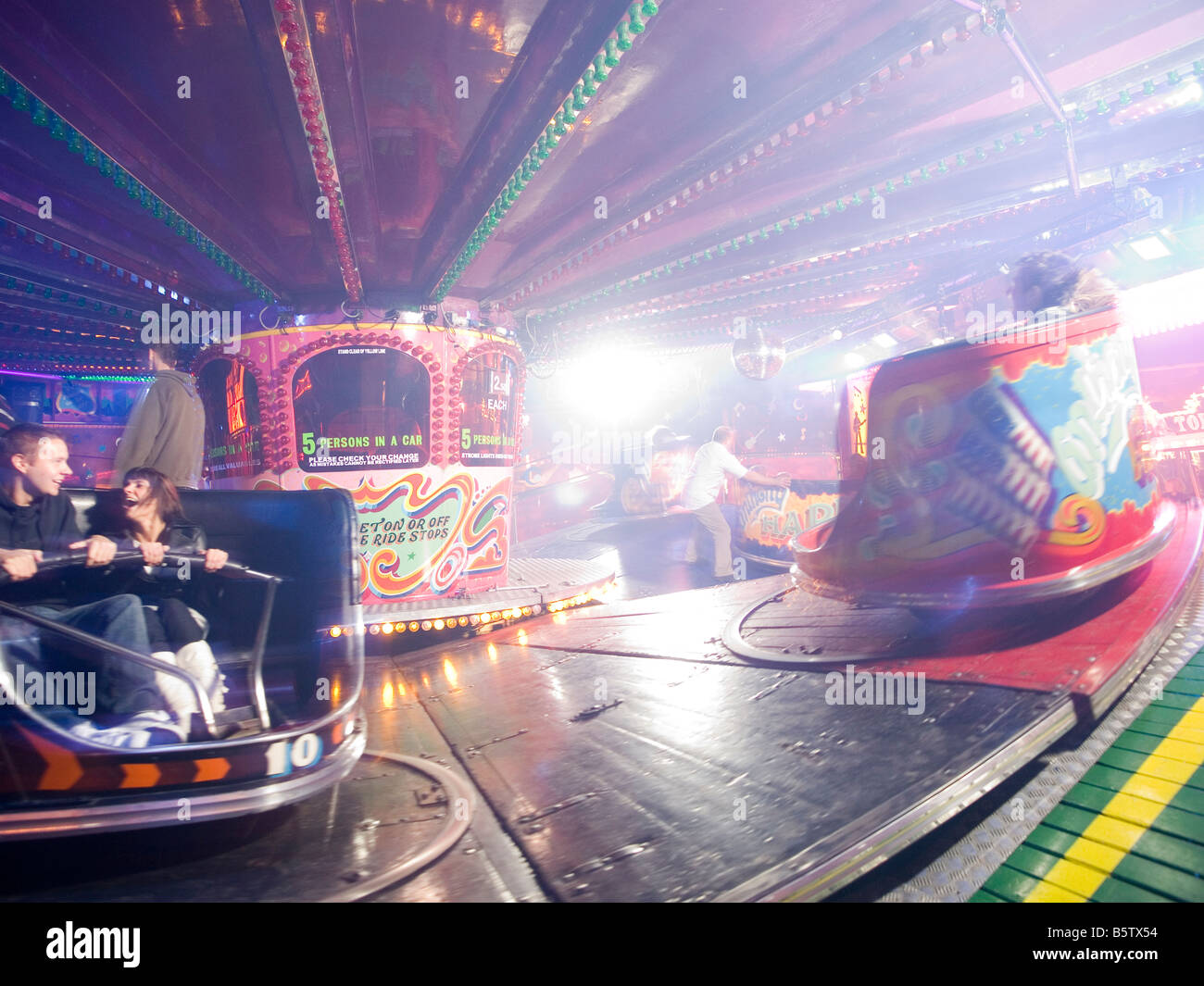 The Waltzers in action at Goose Fair in Nottingham, Nottinghamshire England UK Stock Photo