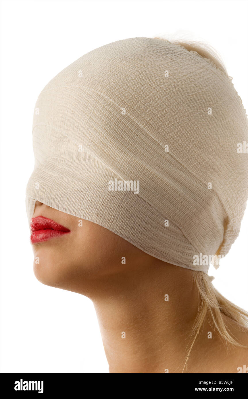 profile of woman with bandage around face and red lips Stock Photo - Alamy