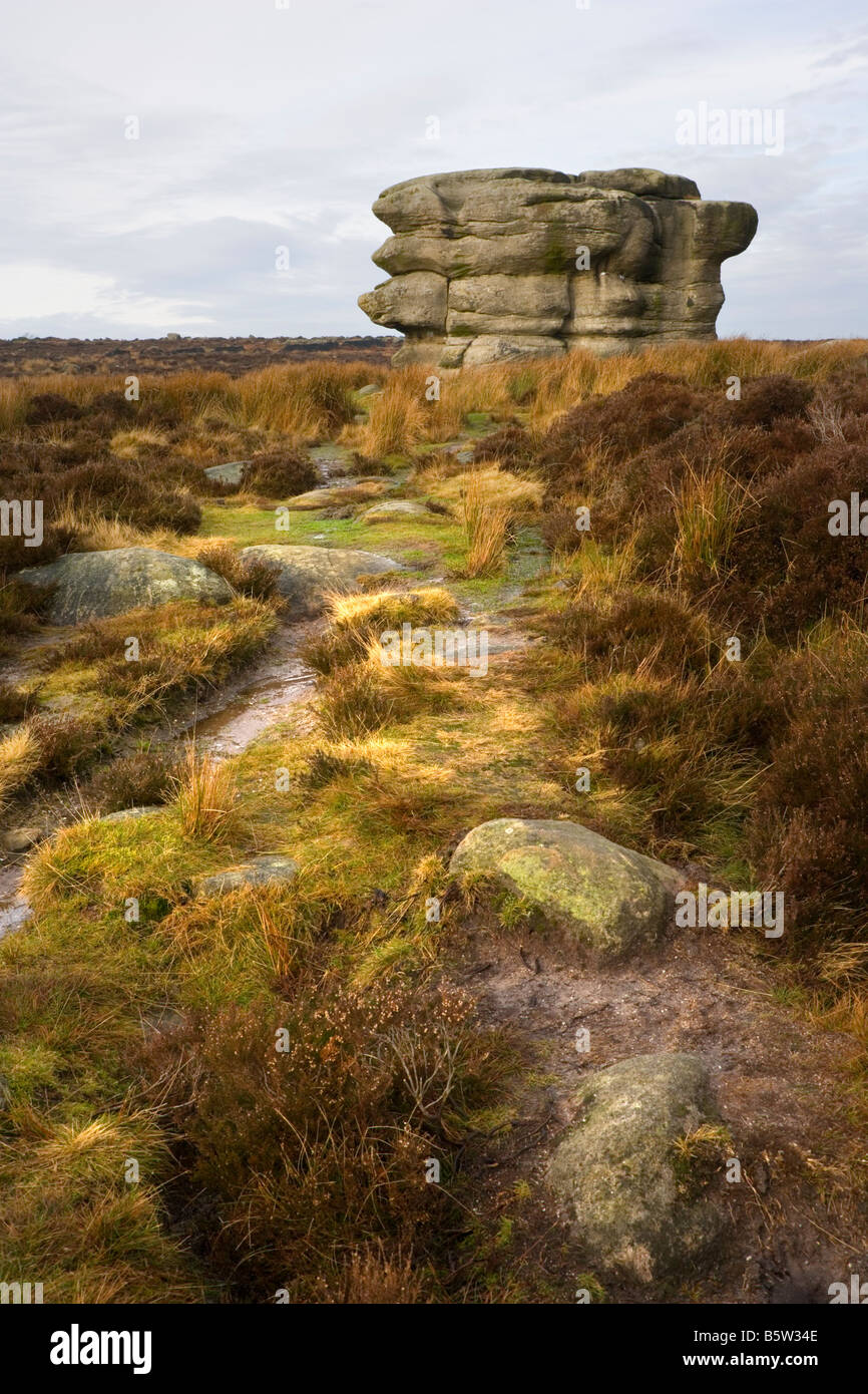 View of the Eagle Stone on Eaglestone Flat at Baslow Edge in the Peak District in Derbyshire Stock Photo