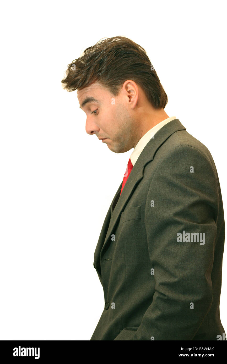 Businessman looking down Stock Photo