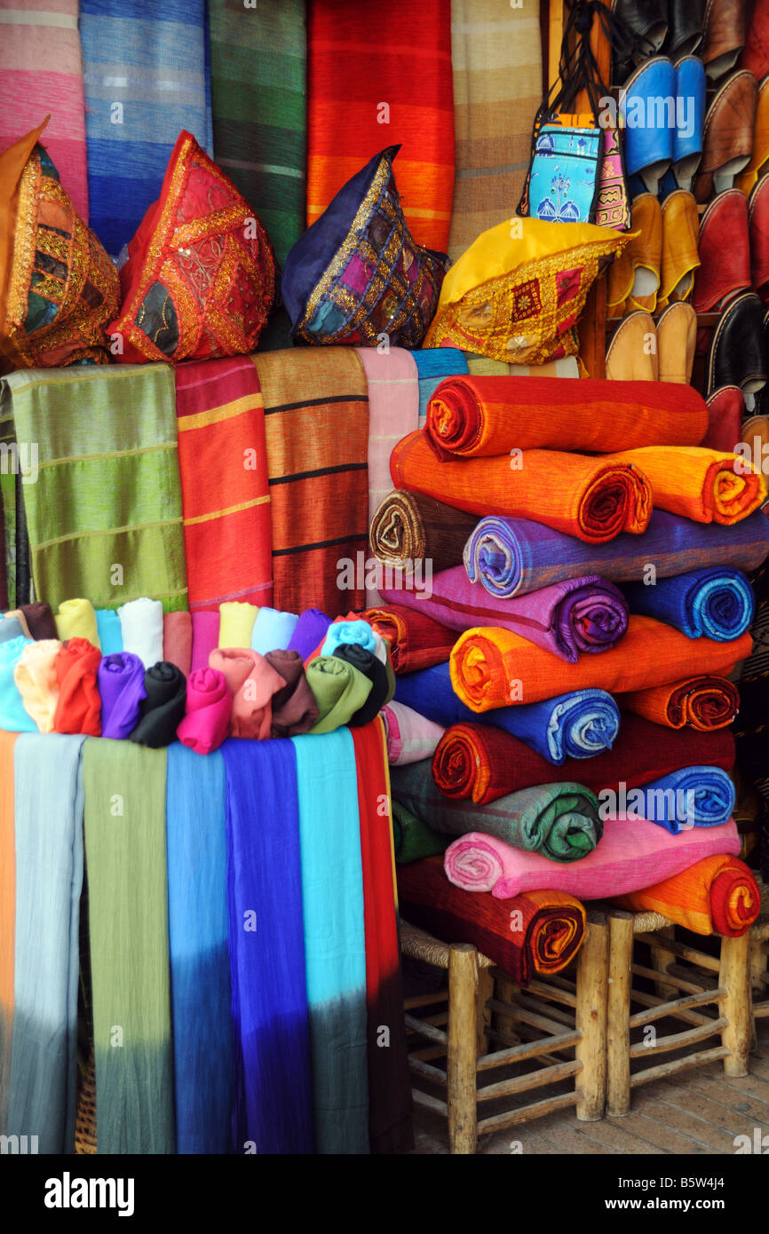 Brightly coloured fabrics and throws for sale in the souk at Essaouira Morocco Stock Photo Alamy