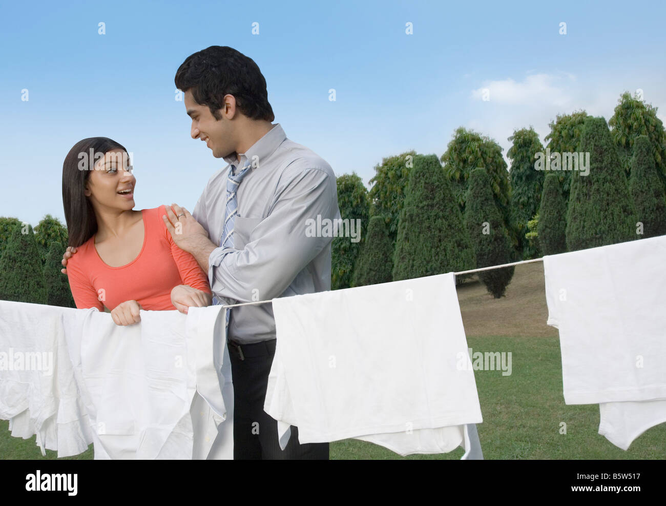 Couple looking at each other and smiling Stock Photo