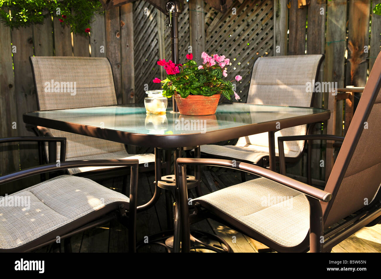 Wooden deck of a house with patio furniture Stock Photo - Alamy