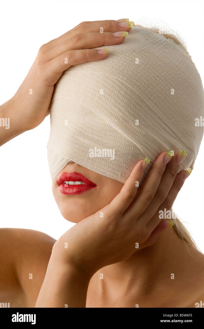 portrait of woman with bandage around face and red lips Stock Photo Alamy