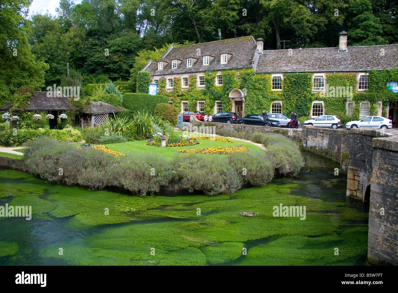 Trout farm in the village of Bibury Gloucestershire England Stock Photo
