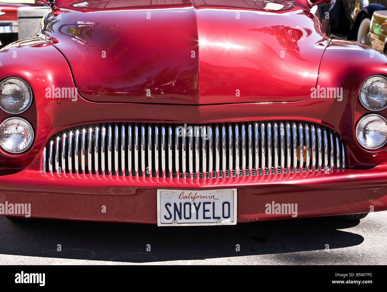 Red two door low rider convertable coupe Stock Photo - Alamy
