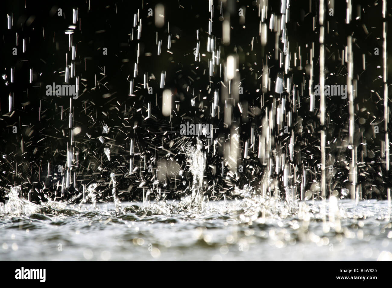 abstract many water drops falling on ground floor Stock Photo - Alamy