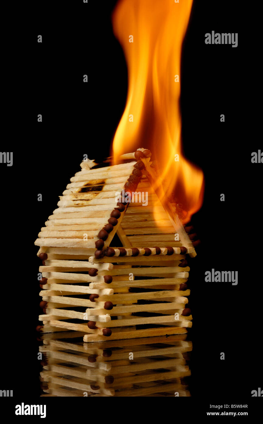 Burning House from Matches Stock Photo