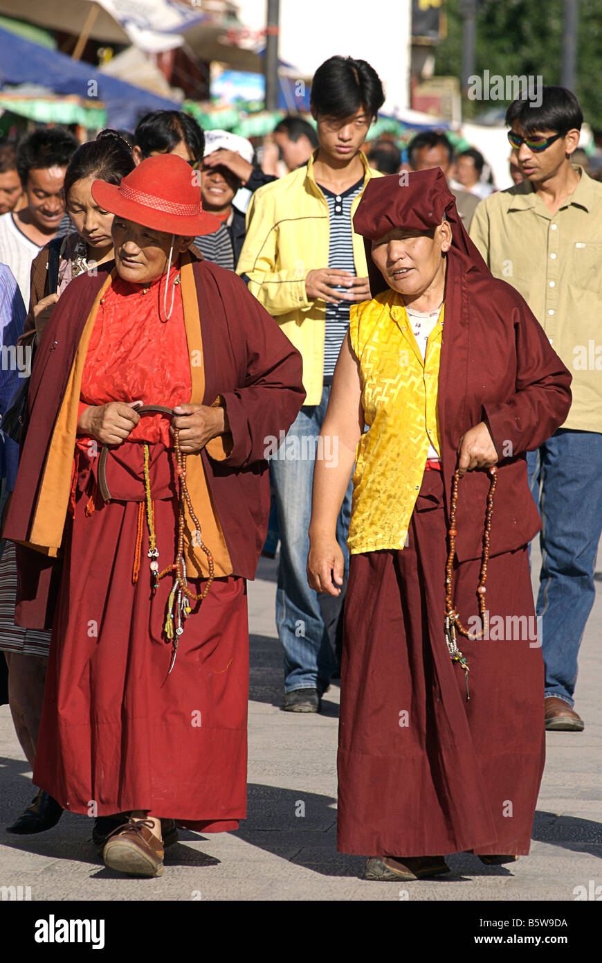 Tibetan buddhist nuns making a perambulation of the Jokhang, Barkhor ...