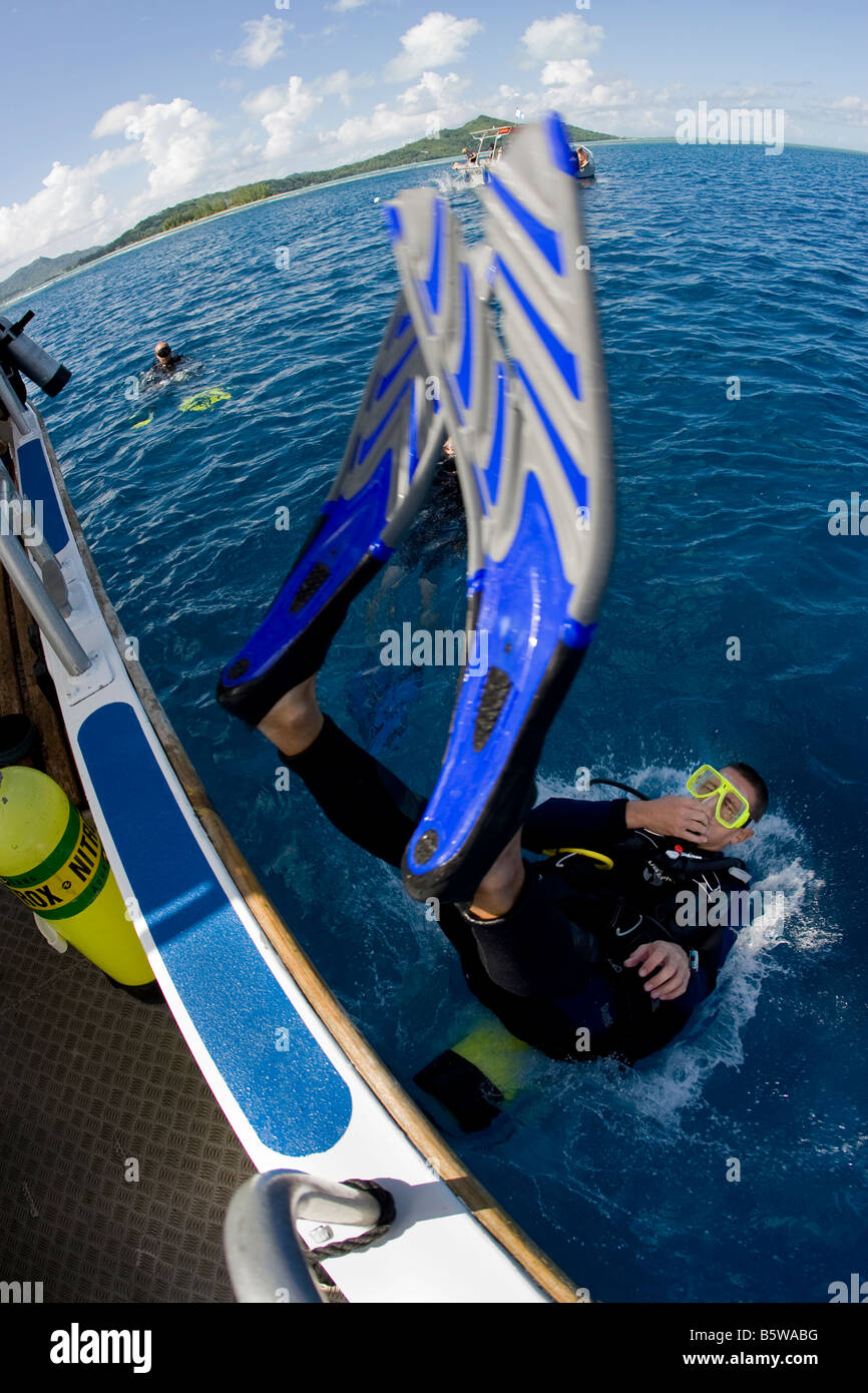 Scuba Diver performs Backward Roll Stock Photo