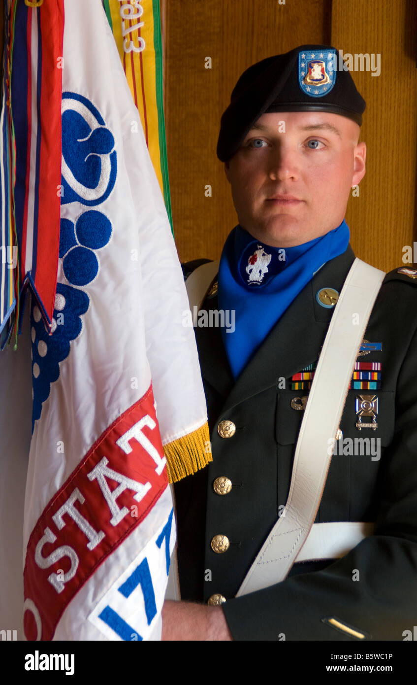 Decorated Iraqi War Veteran, army honor guard displaying flags in San Antonio at Founder's Day celebration Stock Photo