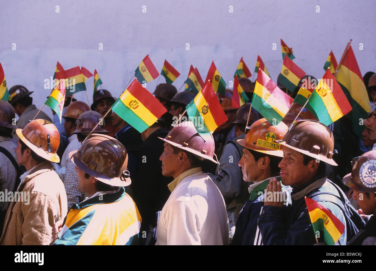 Miners taking part in a march demanding that Congress approves a date for a referendum to vote on a new constitution, La Paz, Bolivia Stock Photo