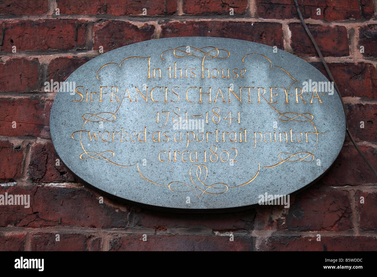 Commemorative wall Plaque in Paradise Square in Sheffield City Centre, England Sir Francis Chantrey Stock Photo
