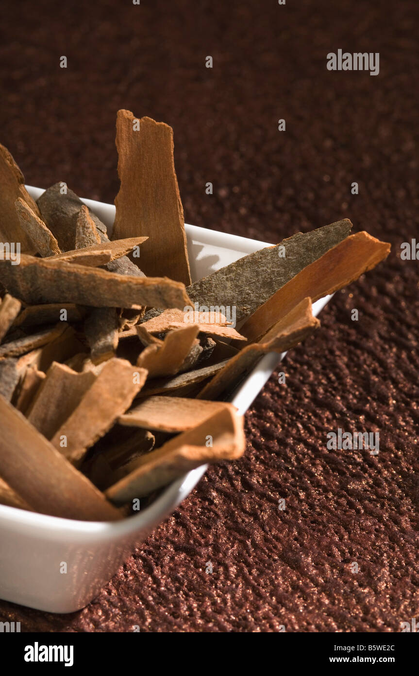 Cinnamon in a bowl Stock Photo