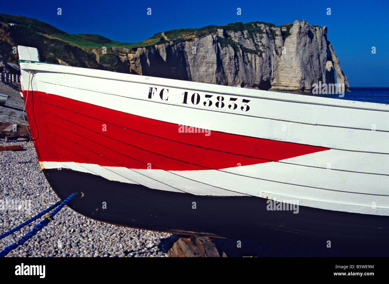 A close up picture of a fishing boat on the beach at Etretat Stock ...