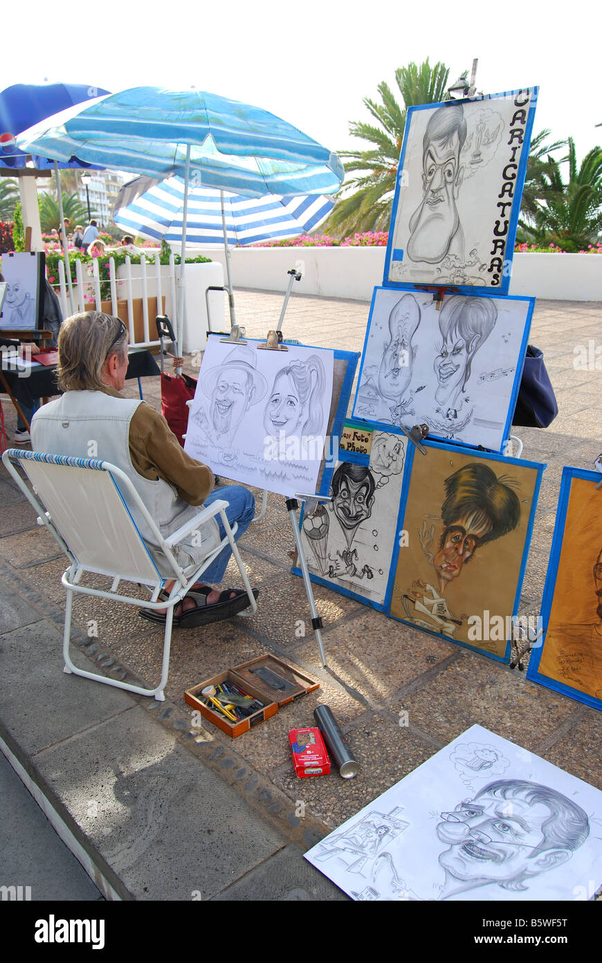 Caricature artist on promenade, Puerto de La Cruz, Tenerife, Canary Islands, Spain Stock Photo