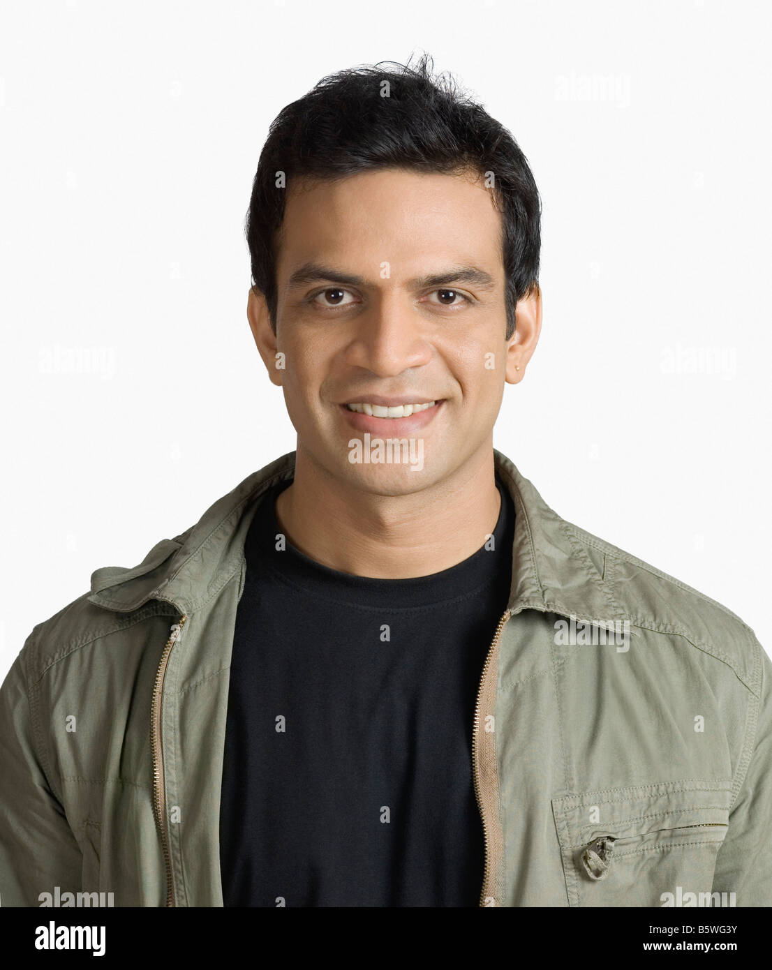 Portrait of a young man smiling Stock Photo - Alamy