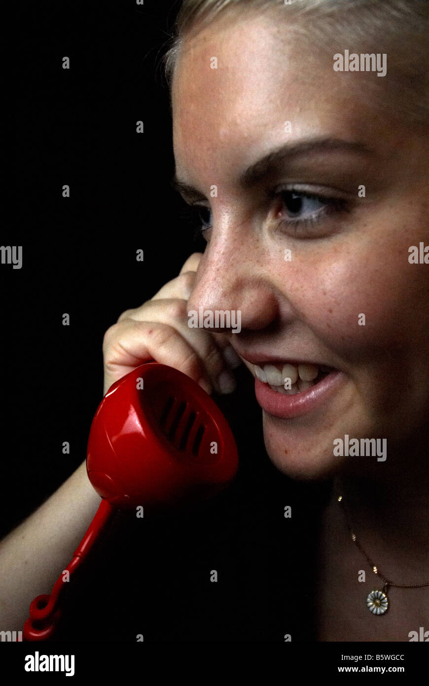 Girl talking in telephone Stock Photo