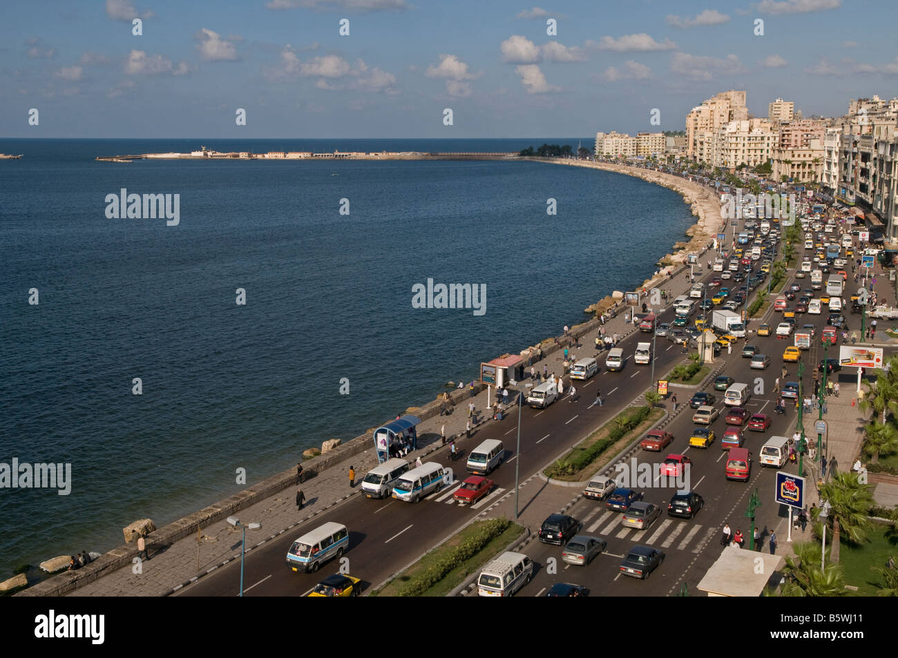 View of the waterfront promenade corniche one of the major corridors for traffic in the city of Alexandria Egypt Stock Photo