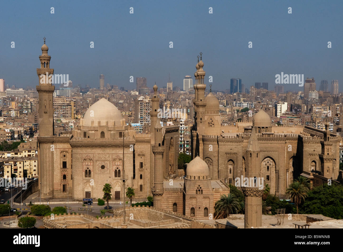Minarets of Al Rifa'i Mosque (right) and Mosque-Madrassa of Sultan Hassan located in Cairo Egypt Stock Photo