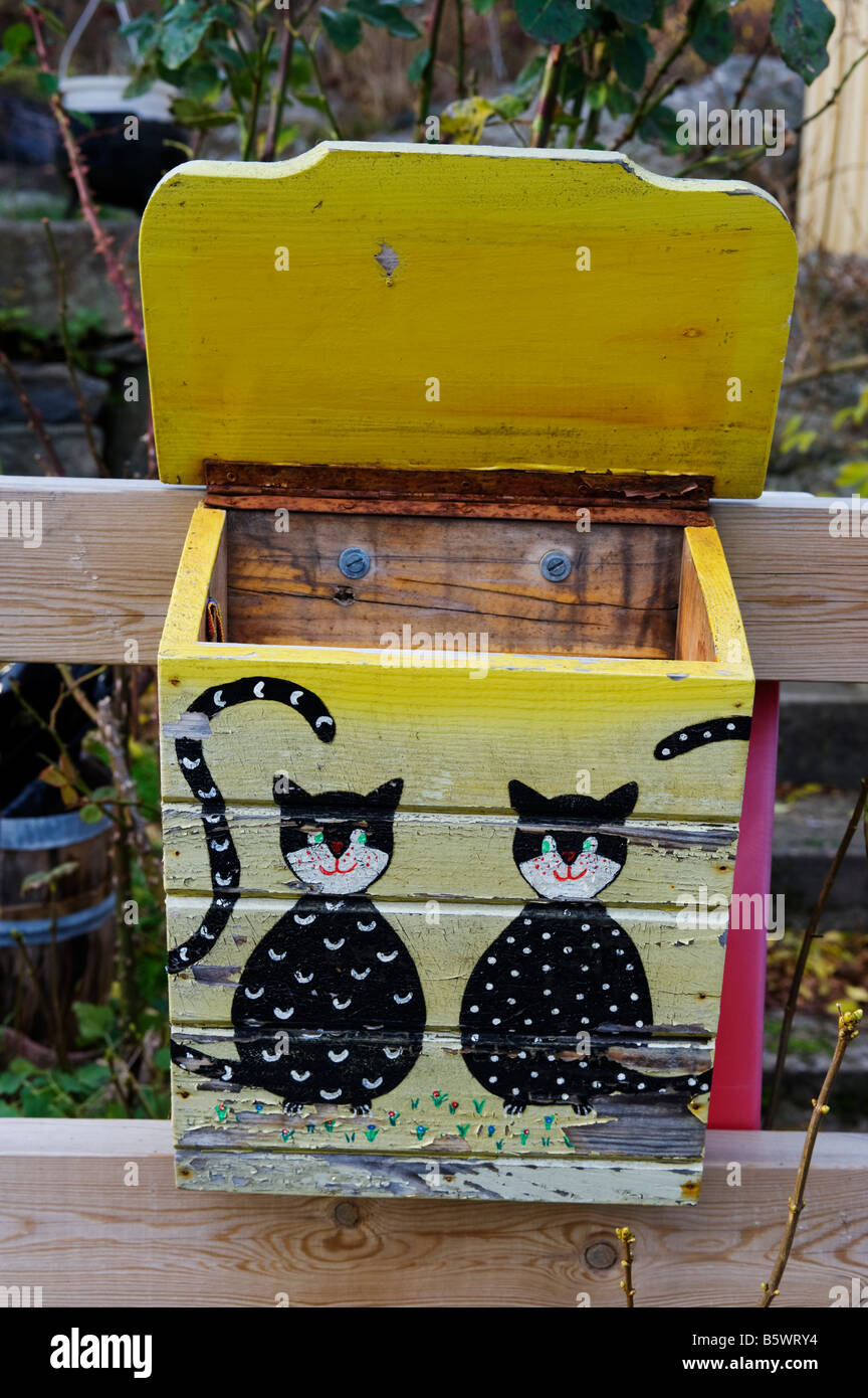 Painted mailbox outside house in village on Swedens Bohuslan coast 2008 Stock Photo