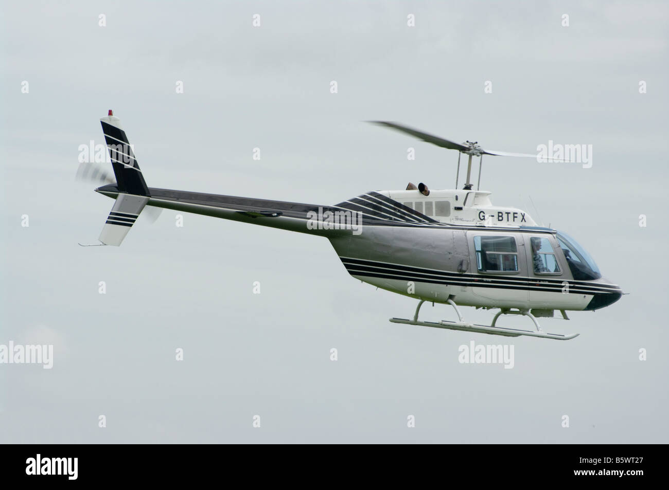 Bell Jet Ranger 11 G BTFX Helicopter in Flight Stock Photo